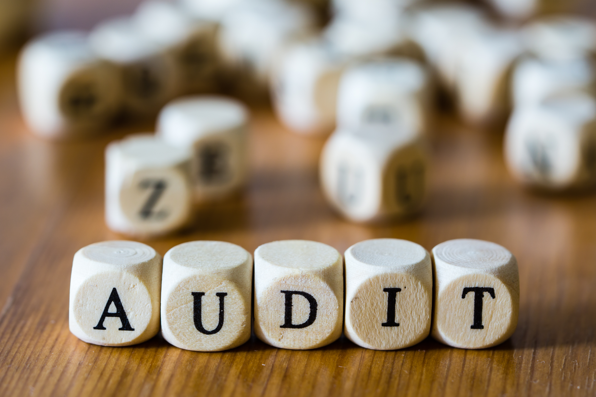 audits-dqs-audit dice next to each other on the table