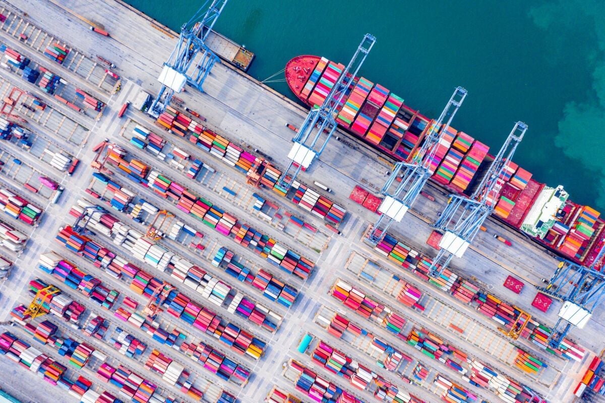 Top view of Deep water port with cargo ship and containers. It is an import and export cargo port wh