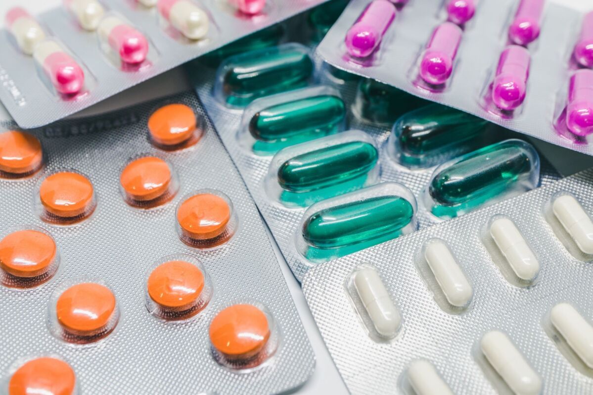 Colorful tablets and capsules in blister packaging