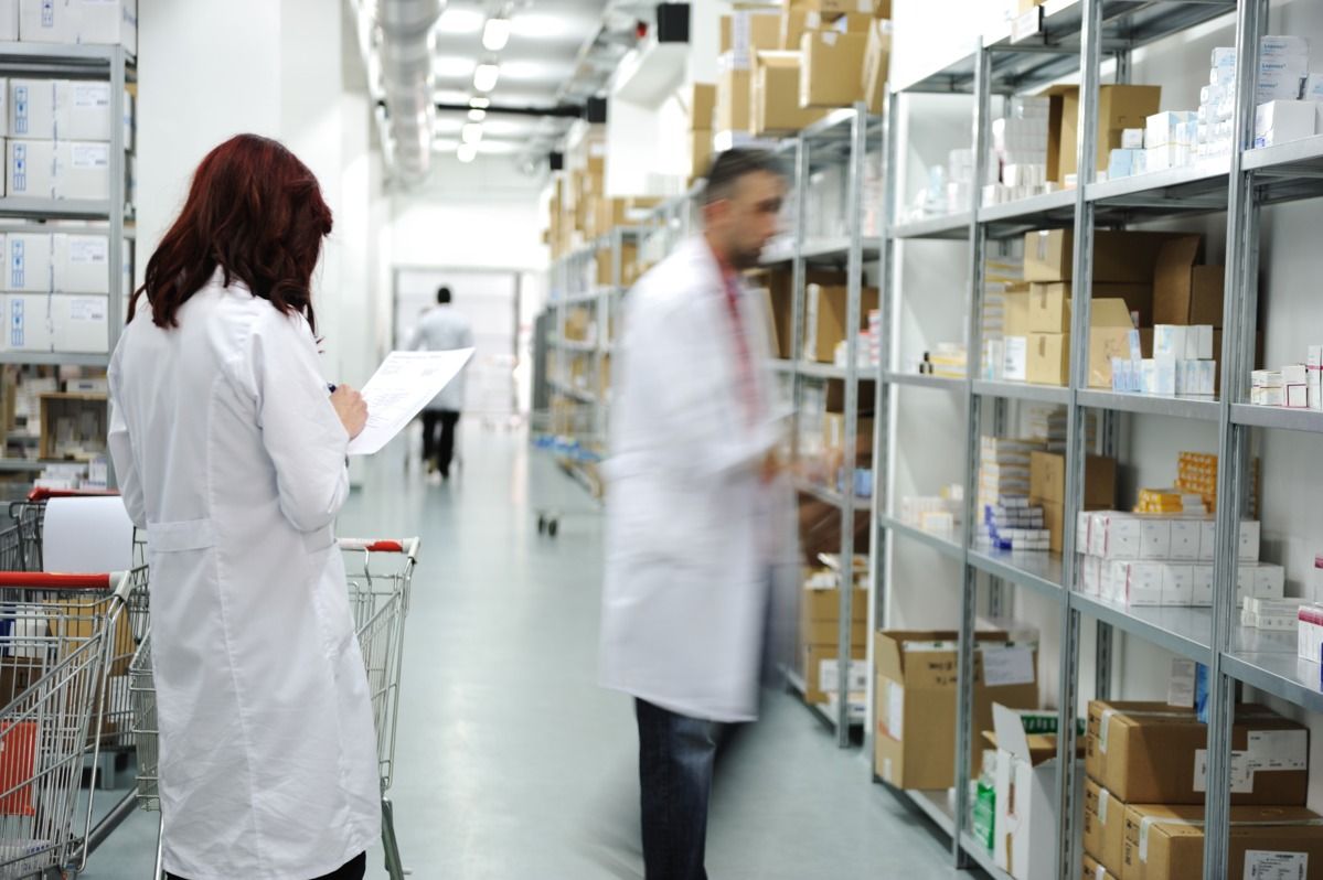 Woman standing in a medication warehouse