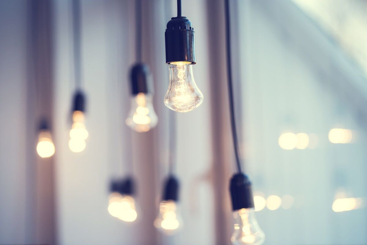 iful festoon light bulb hanging at the window. Lighting decor