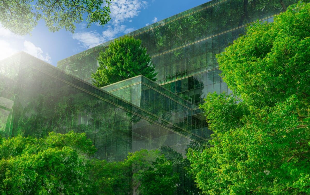 The green façade of an office building