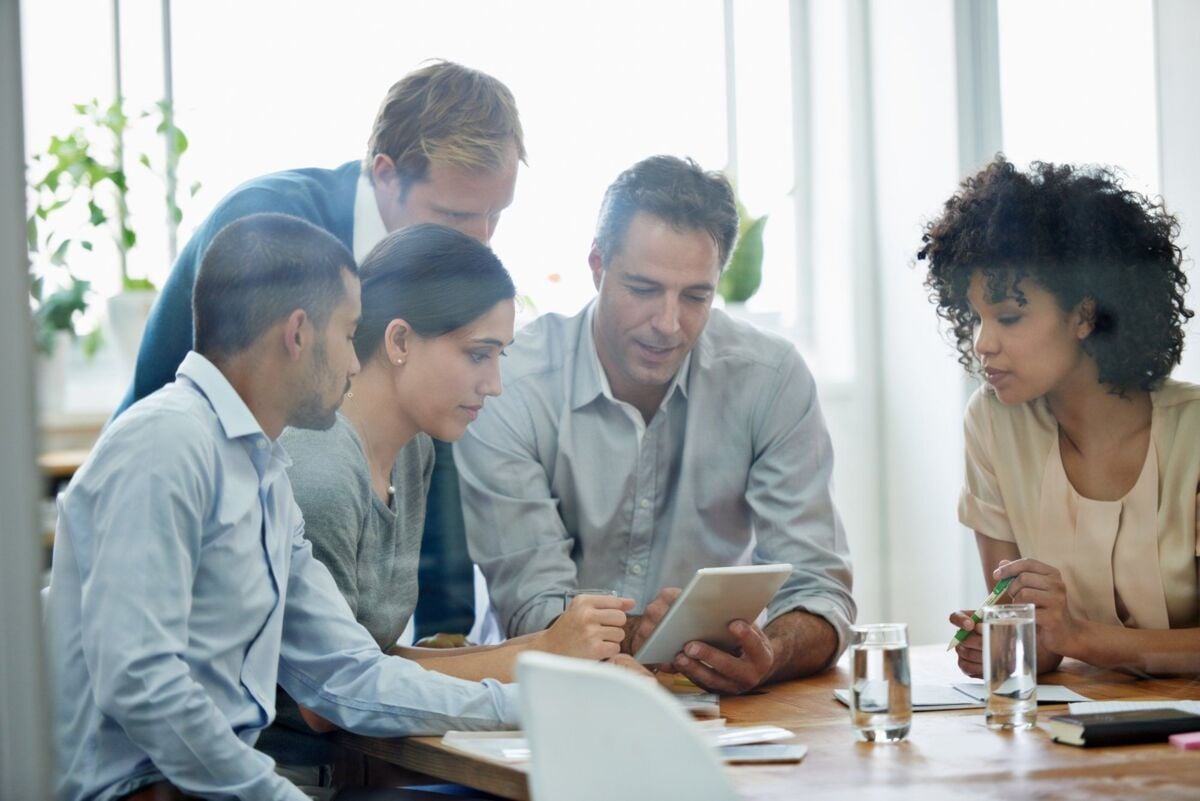 Lets browse for a few ideas. Shot of a group of professionals using wireless technology during a mee