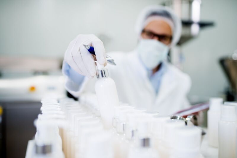 Healthcare industry. Creme production. Working in laboratory with special equipment.
