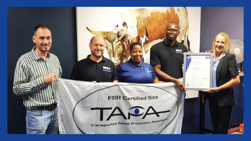 The image depicts a significant moment for Bradian Logistics Solutions as they receive their TAPA FS