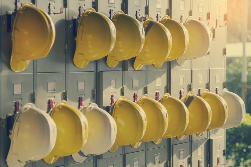 occupational safety-dqs-work helmets hanging on lockers